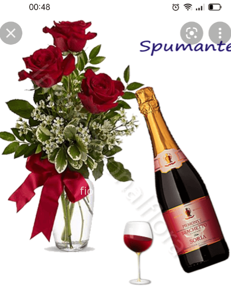 Tre rose rosse e vino